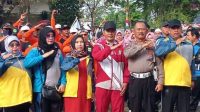 SAMARAKAN HUT RI KE 78 DAN HARI JADI KAB BEKASI KE 73 MUSPIKA KECAMATAN KARANG BAHAGIA GELAR JALAN SEHAT