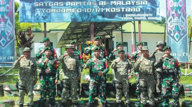 Satgas Yonarmed 10 Kostrad Terima Kunjungan Tentara Diraja Malaysia