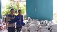 Polsek Penukal Abab Hadiri Giat Pendistribusian Beras Cadangan Pangan Pemerintah