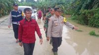 Kapolsek Tanah Abang, AKP. Darmawansyah, S.H.M.H, Memimpin Kegiatan Monitoring dan Patroli Banjir di Desa Tanjung Dalam