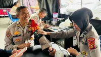 Tim Dokkes Polda Sumsel dan Jajaran Lakukan Patroli Sambang TPS, Berikan Layanan Kesehatan Petugas