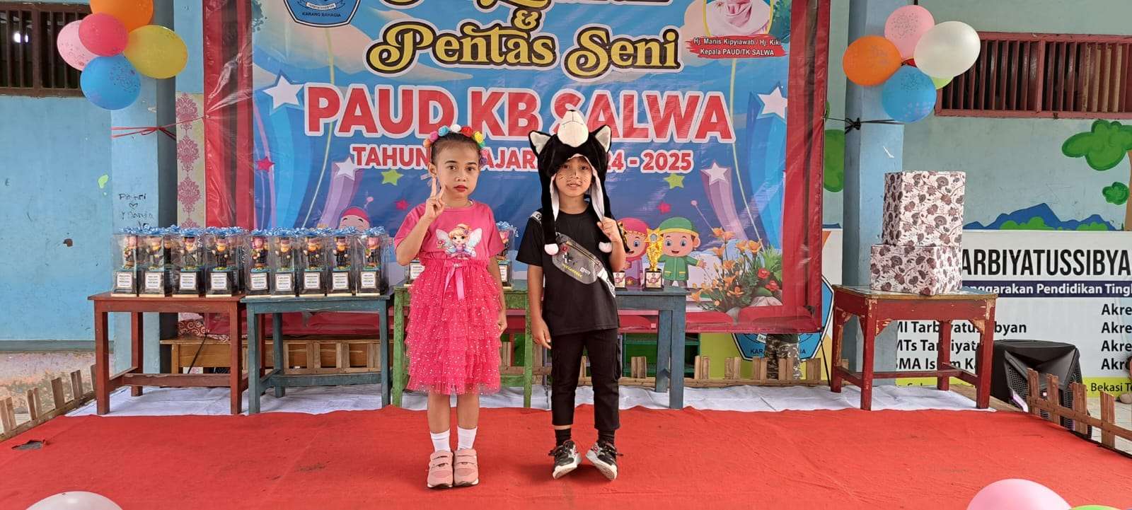 Keterangan foto: Salsabila Safitri dab Arsyah Ramadhan siswa-siswi Paud KB Salwa 