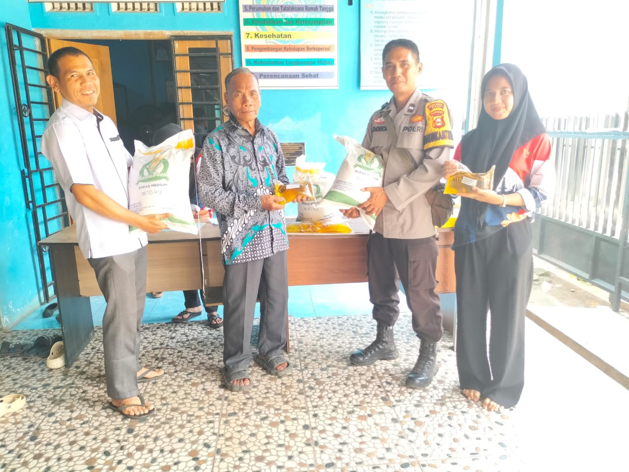 PENGAMANAN PENYALURAN BANTUAN PANGAN BERAS & MINYAK GORENG TAHAP II DI KECAMATAN PENUKAL UTARA