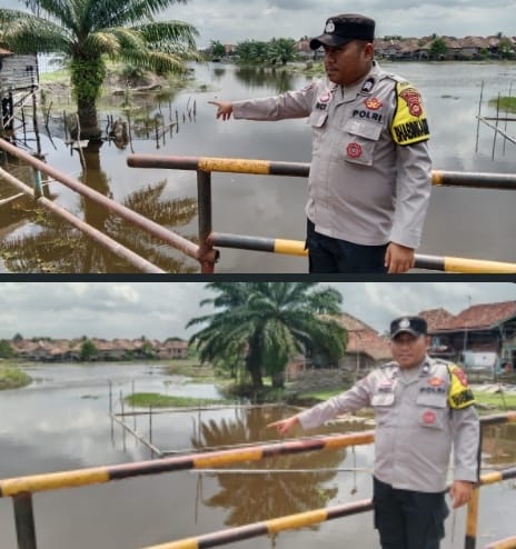 Polsek Penukal Utara Monitoring Debit Air, Lima Desa Rawan Banjir Masih Aman