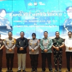 Keterangan foto : Pelaksana Tugas (Plt) Bupati Bekasi Asep Surya Atmaja menghadiri acara pisah sambut Kapolres Metro Bekasi di Gedung Promoter Polres Metro Bekasi, Cikarang Utara, Kamis (1/10/2026).
